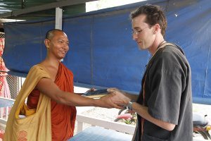 Handing Ashin his Dignity book