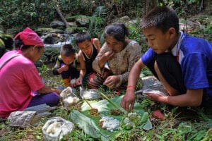 northern thailand hilltribes - jeffrey warner - lahu women and youth eating lunch in the forest - resilience