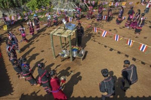 thailand's hilltribe people - jeffrey warner - development - lahu dancing in a circle at the new year celebration